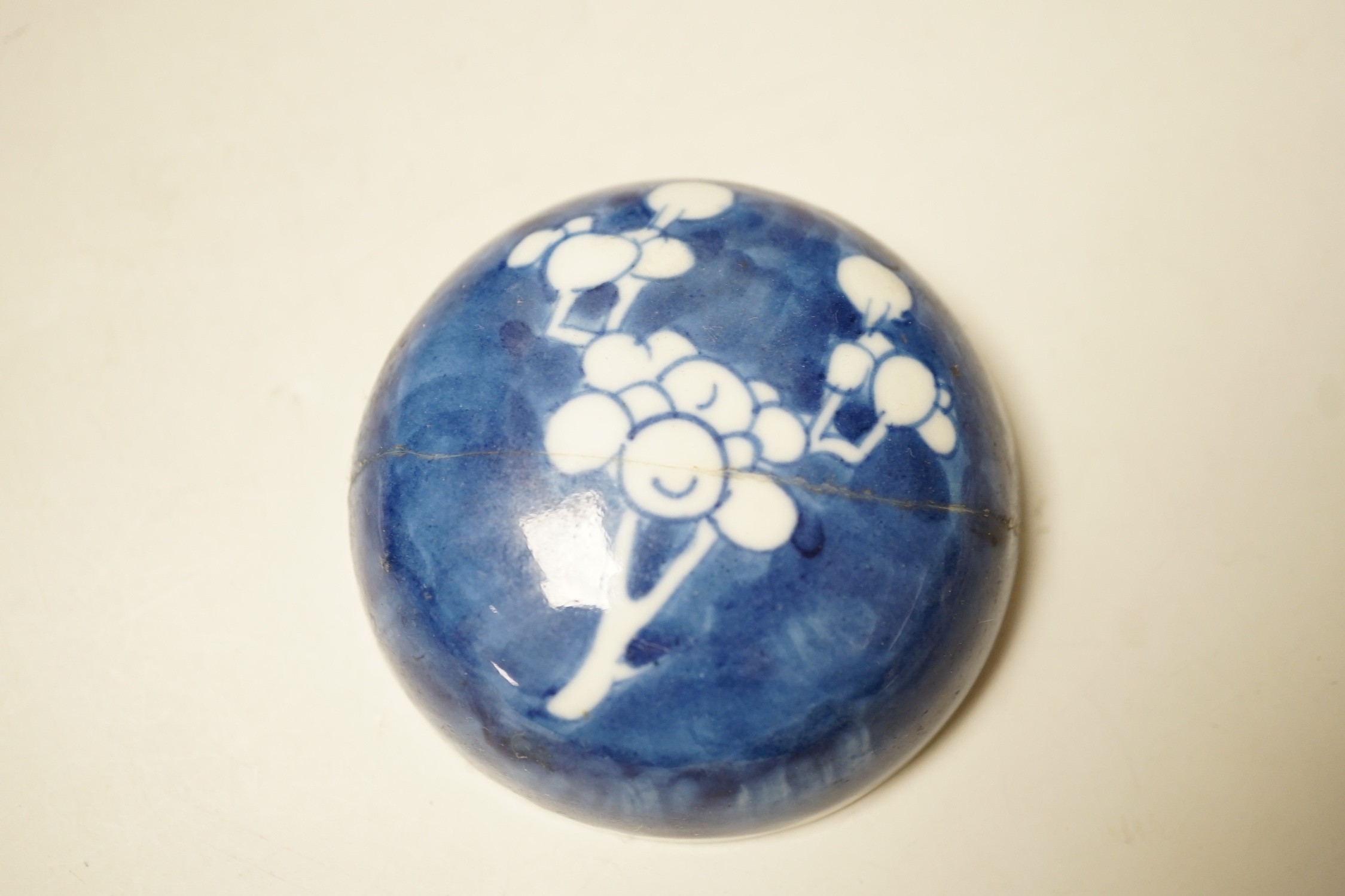 A pair of Chinese Blue and white prunus ginger jars. 15cm tall